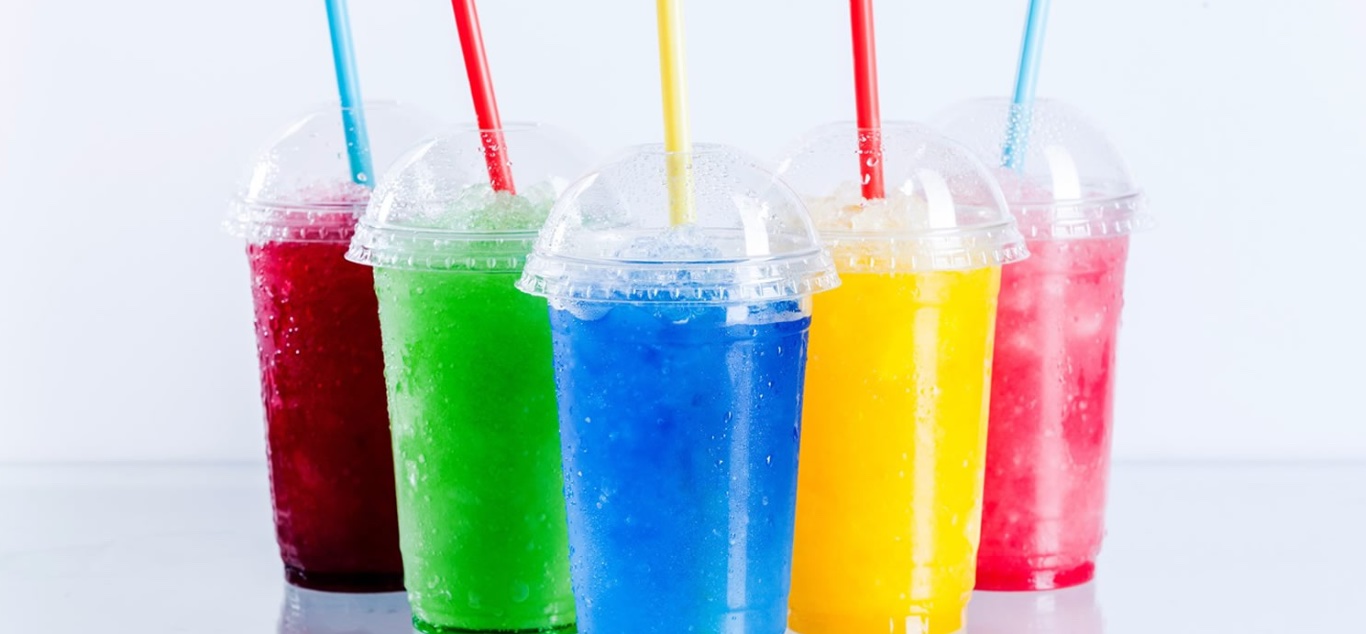 Different Color sugary drinks with colorful straws